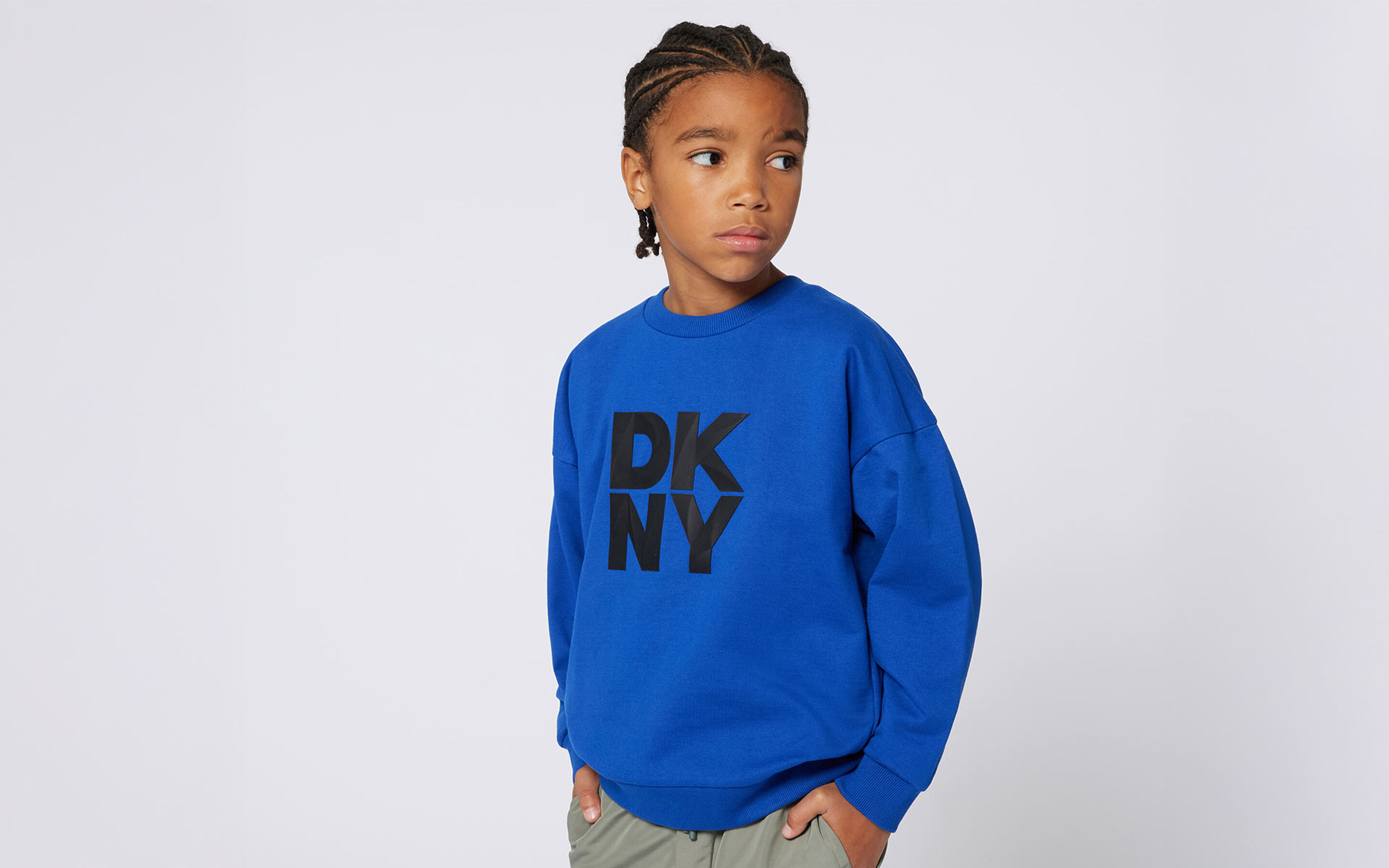 Sweaters DKNY brand on kids around